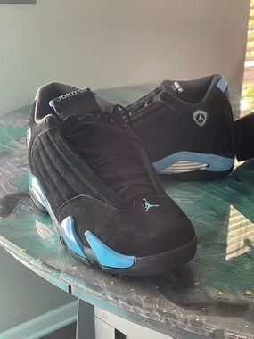 Air Jordan 14 Retro Men’s Black and University Blue Retro Sneakers